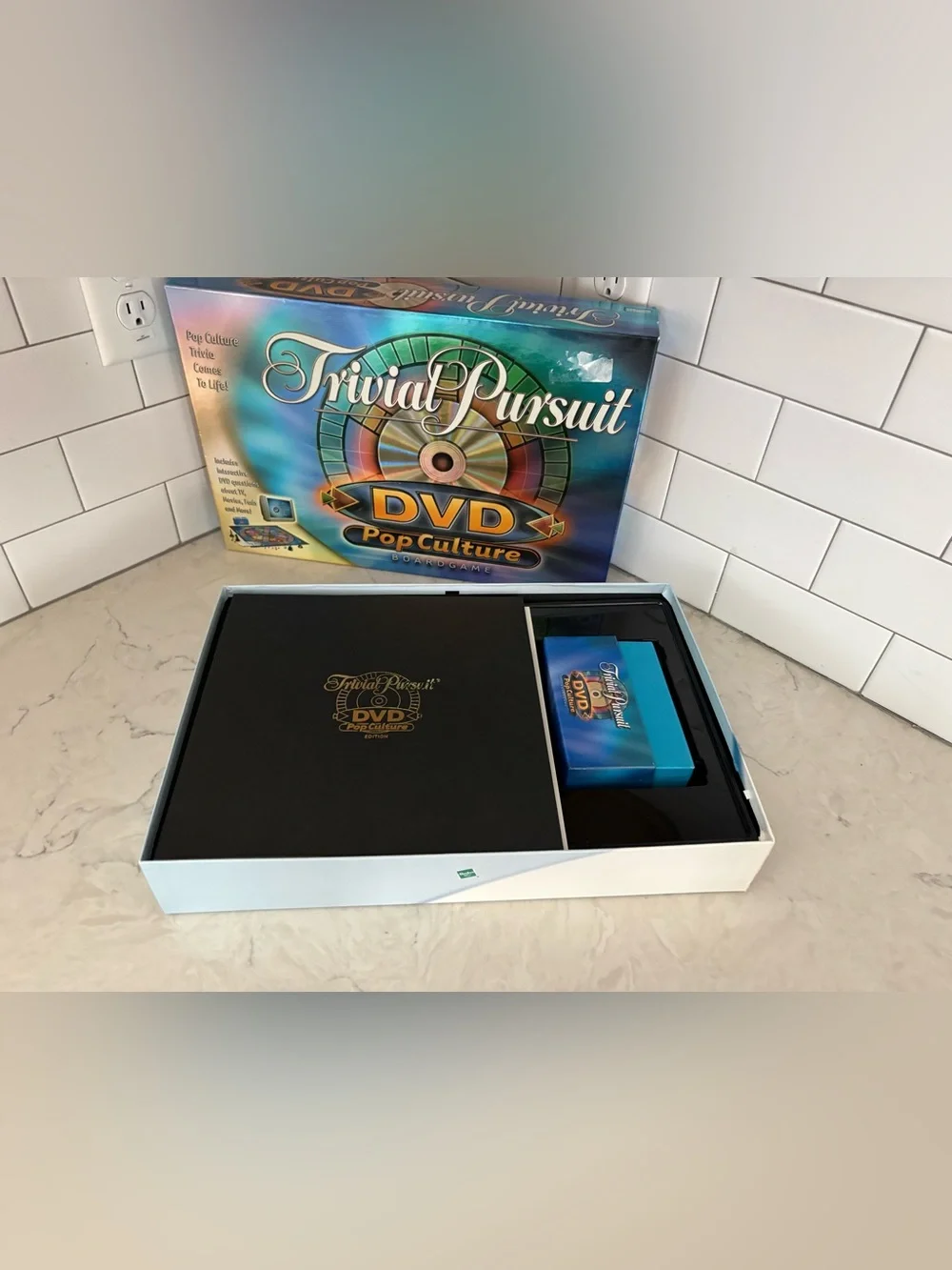 Trivia Pursuit DVD Pop Culture Board Game by Parker Brothers.